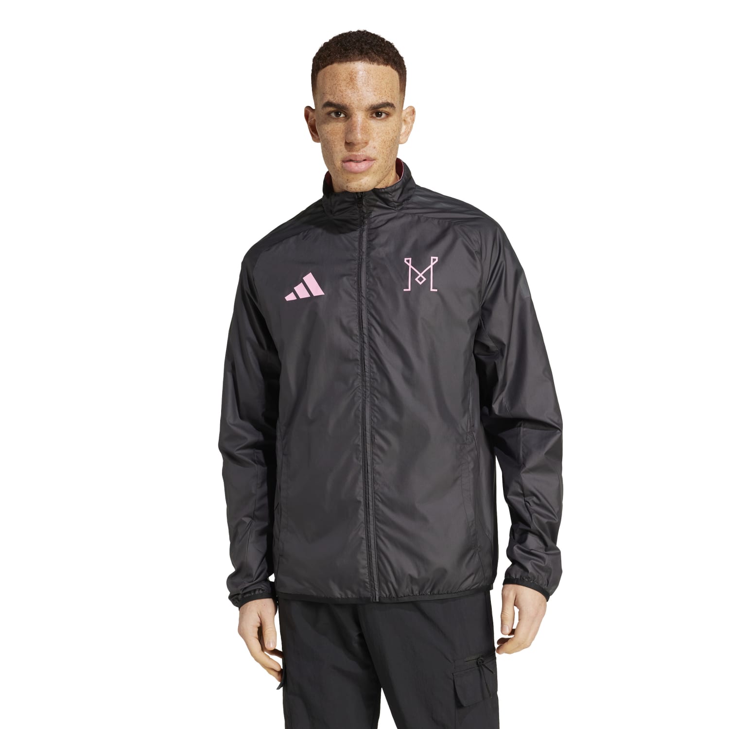 Lifestyle photo of stylish pink jacket for men worn casually outdoors