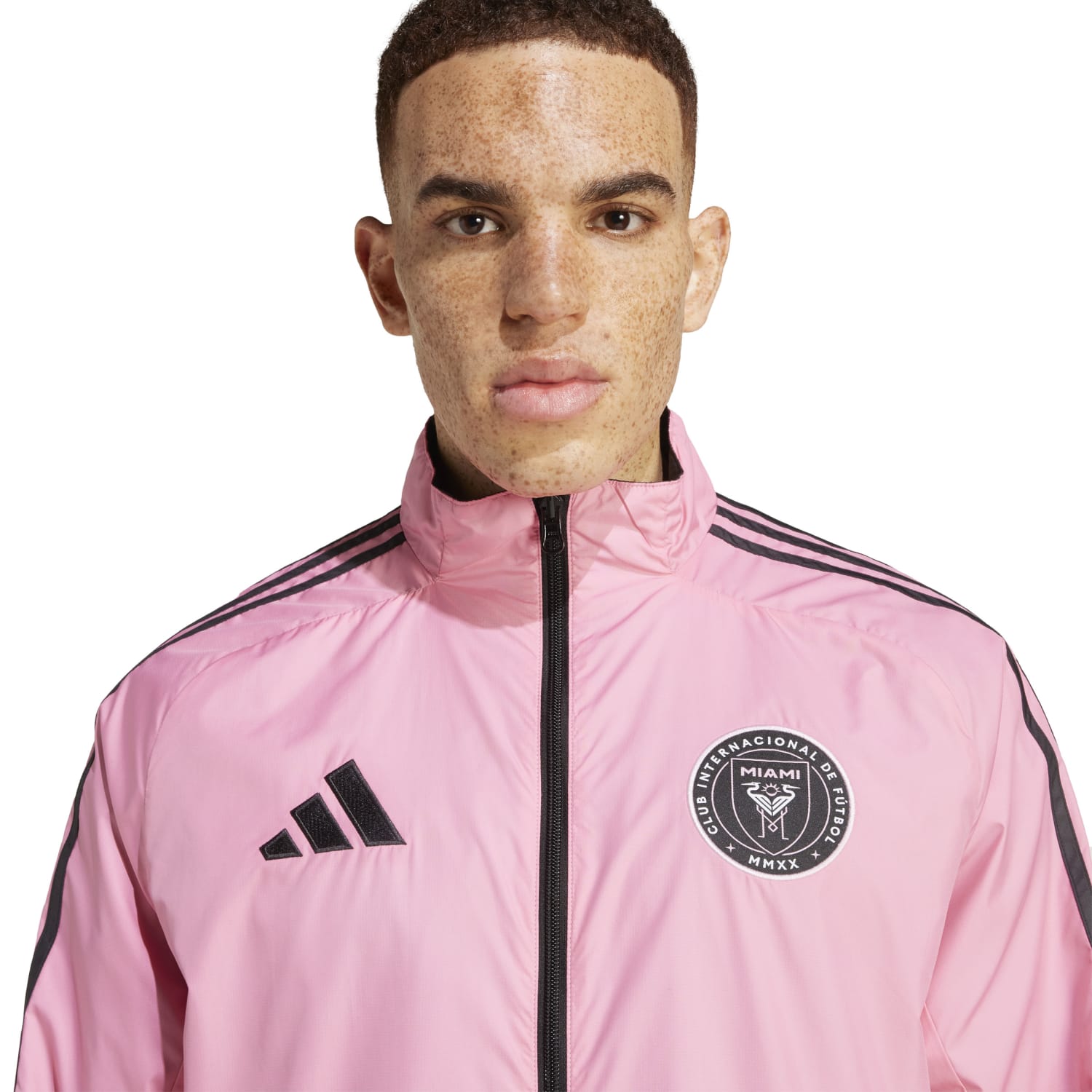 Side angle of mens sports jacket featuring adjustable hood and soft material