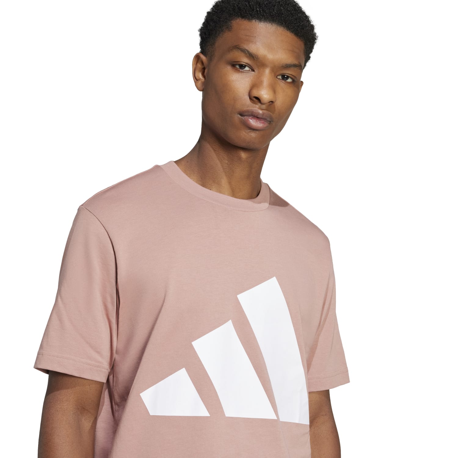 Lifestyle shot: guy in black adidas cotton tee stretching post-workout, showcasing fit and movement