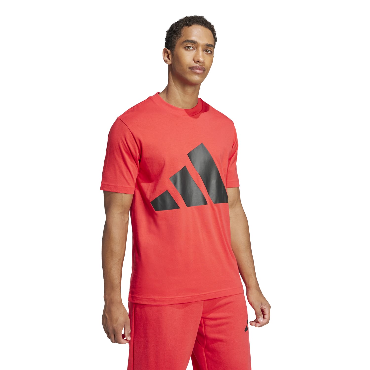 Adidas mens shirt worn during a workout, demonstrating its versatility and style.