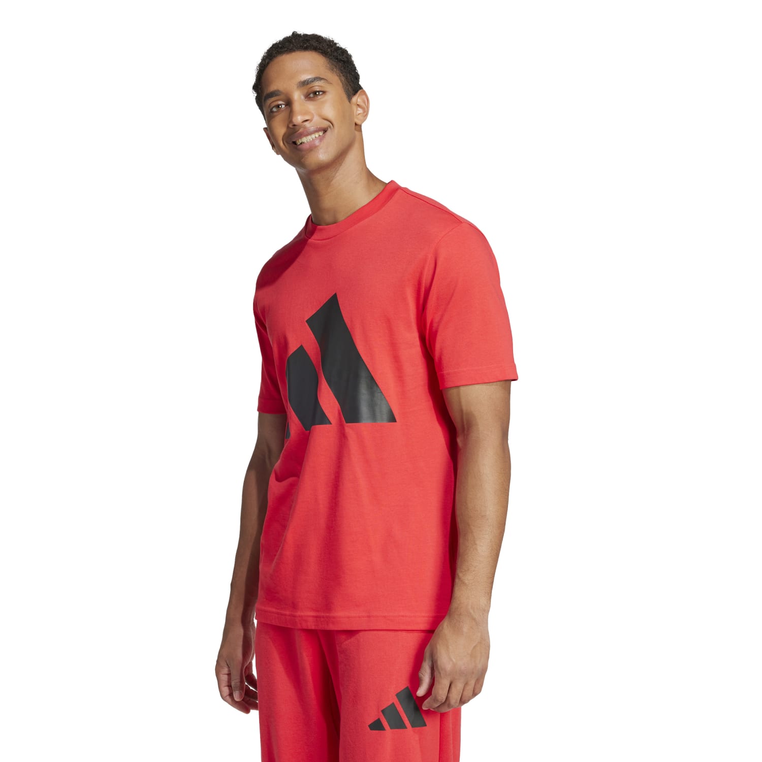 Side angle of the Adidas mens sport tee, highlighting the ribbed crewneck and design.