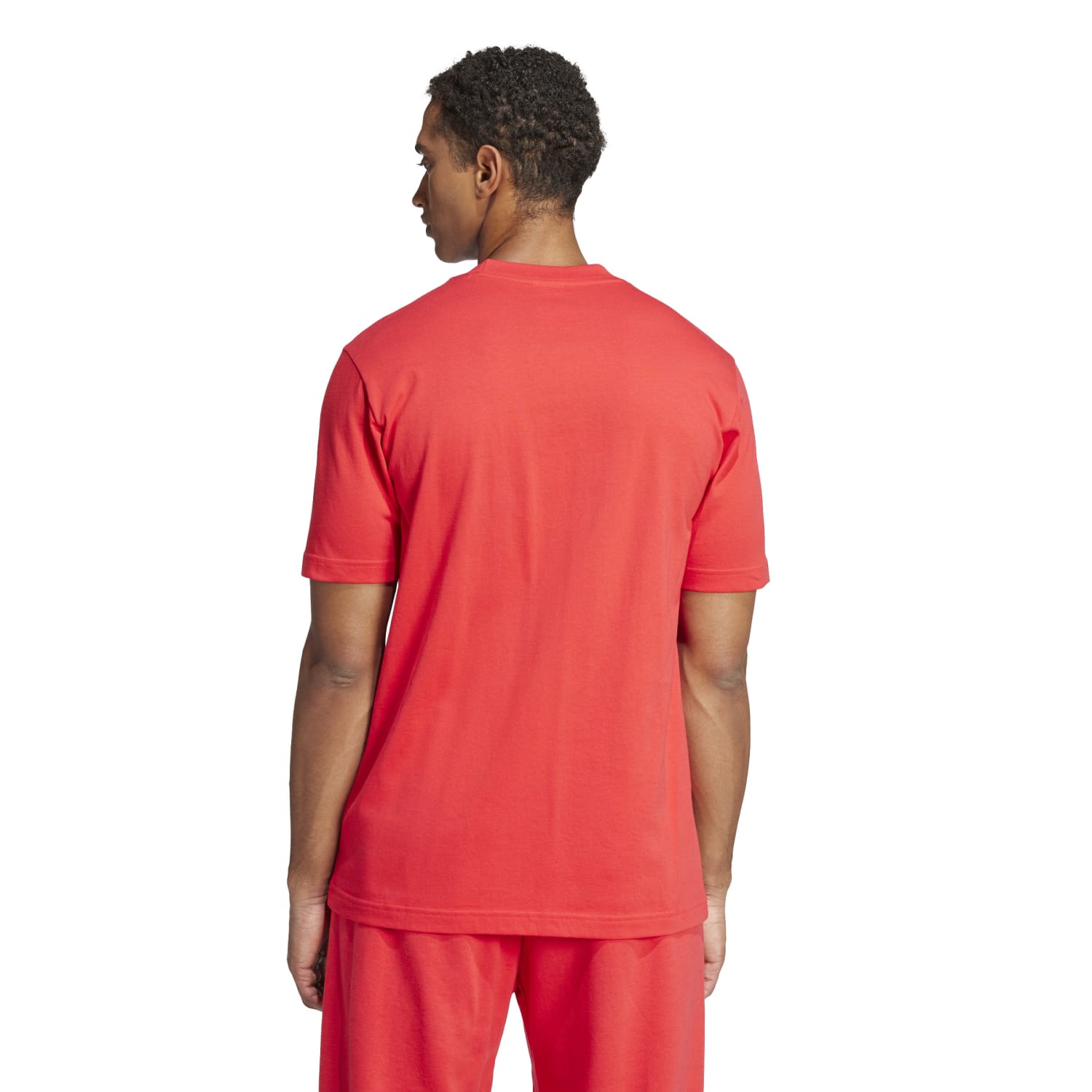 Adidas mens shirt worn during a workout, demonstrating its versatility and style.