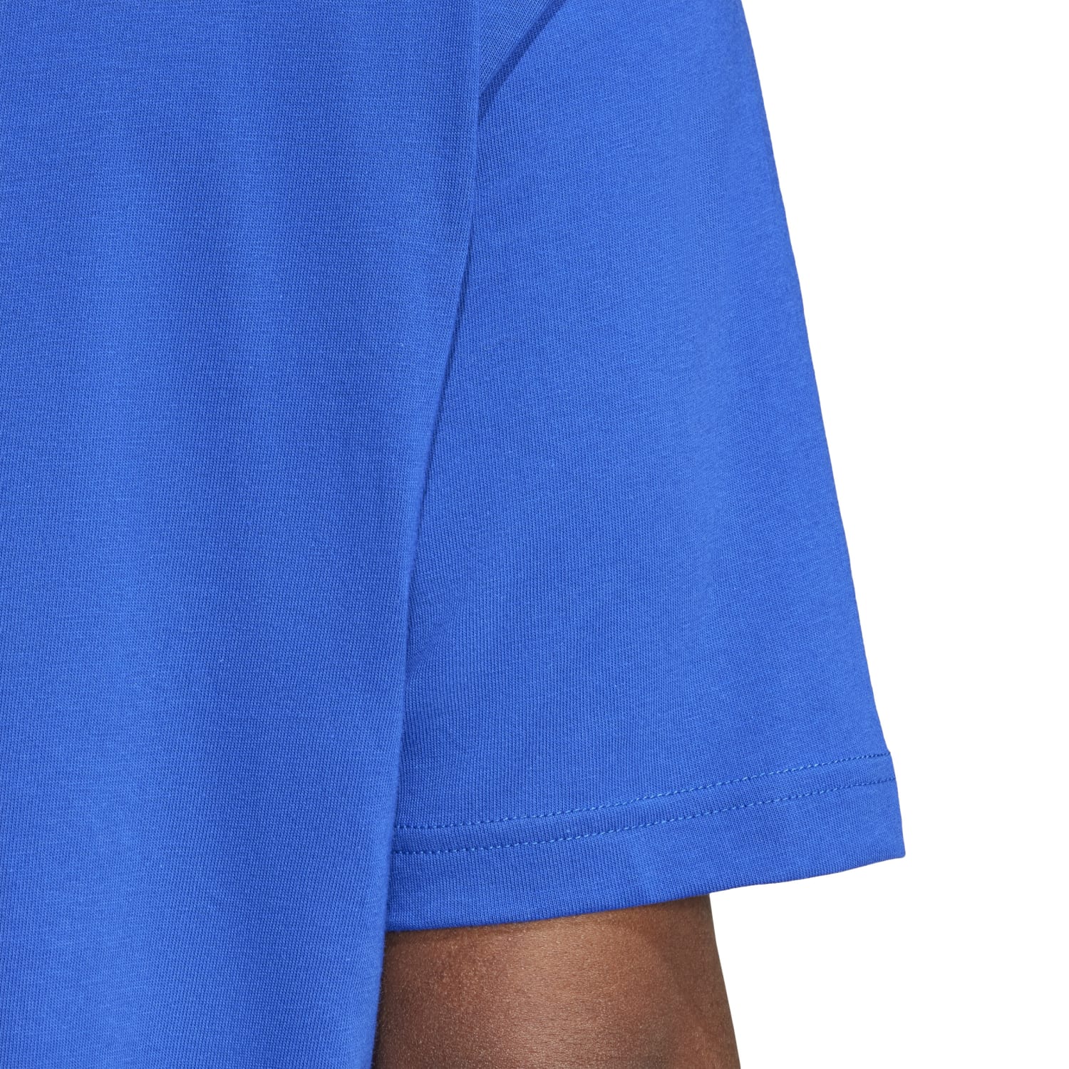 Model wearing Adidas mens athletic t-shirt during a workout session, showcasing its comfortable fit.