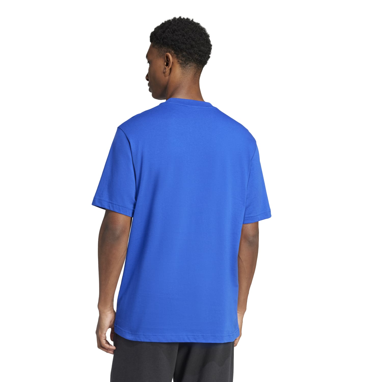 Adidas Essential tee displayed on a hanger, emphasizing its premium cotton fabric and stylish design.