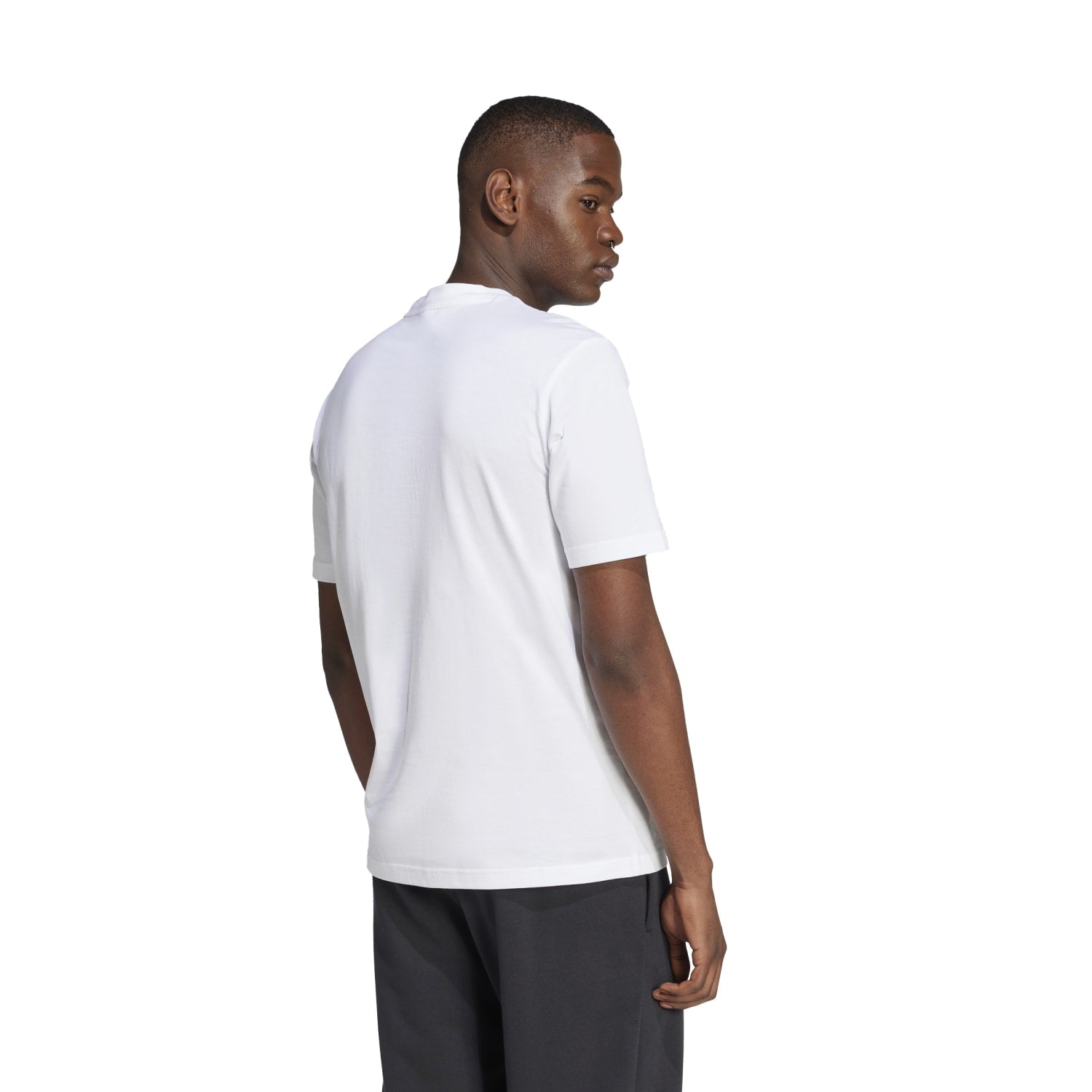 Model wearing mens casual workout t-shirt during outdoor activity