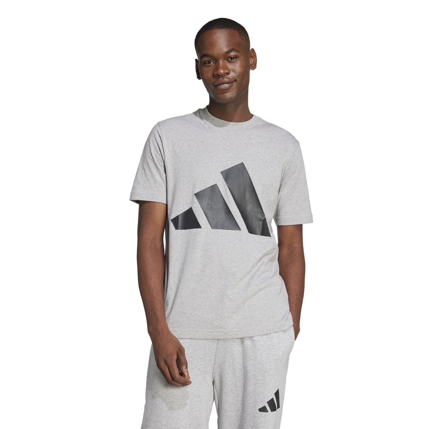 Side profile showing regular fit and ribbed crewneck of mens t-shirt