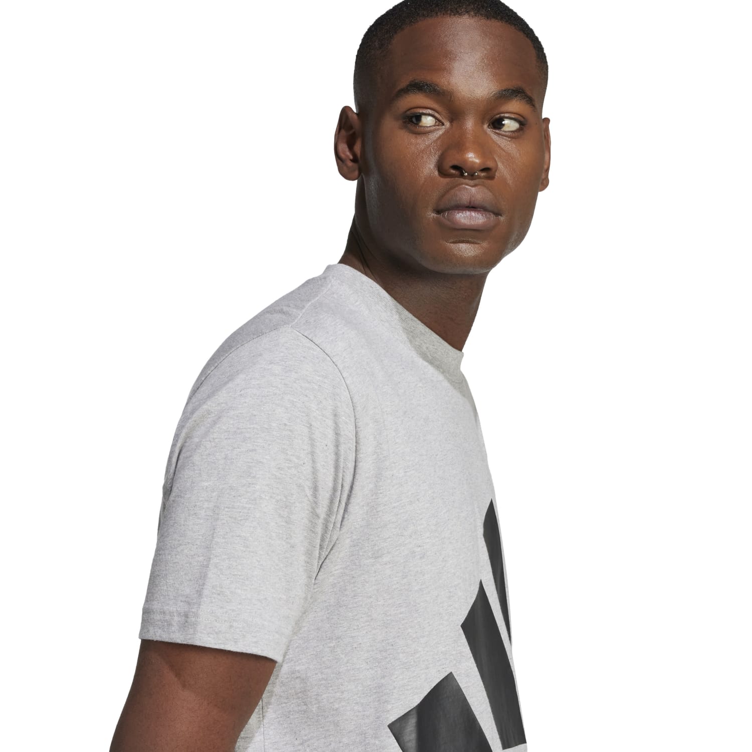 Side profile showing regular fit and ribbed crewneck of mens t-shirt