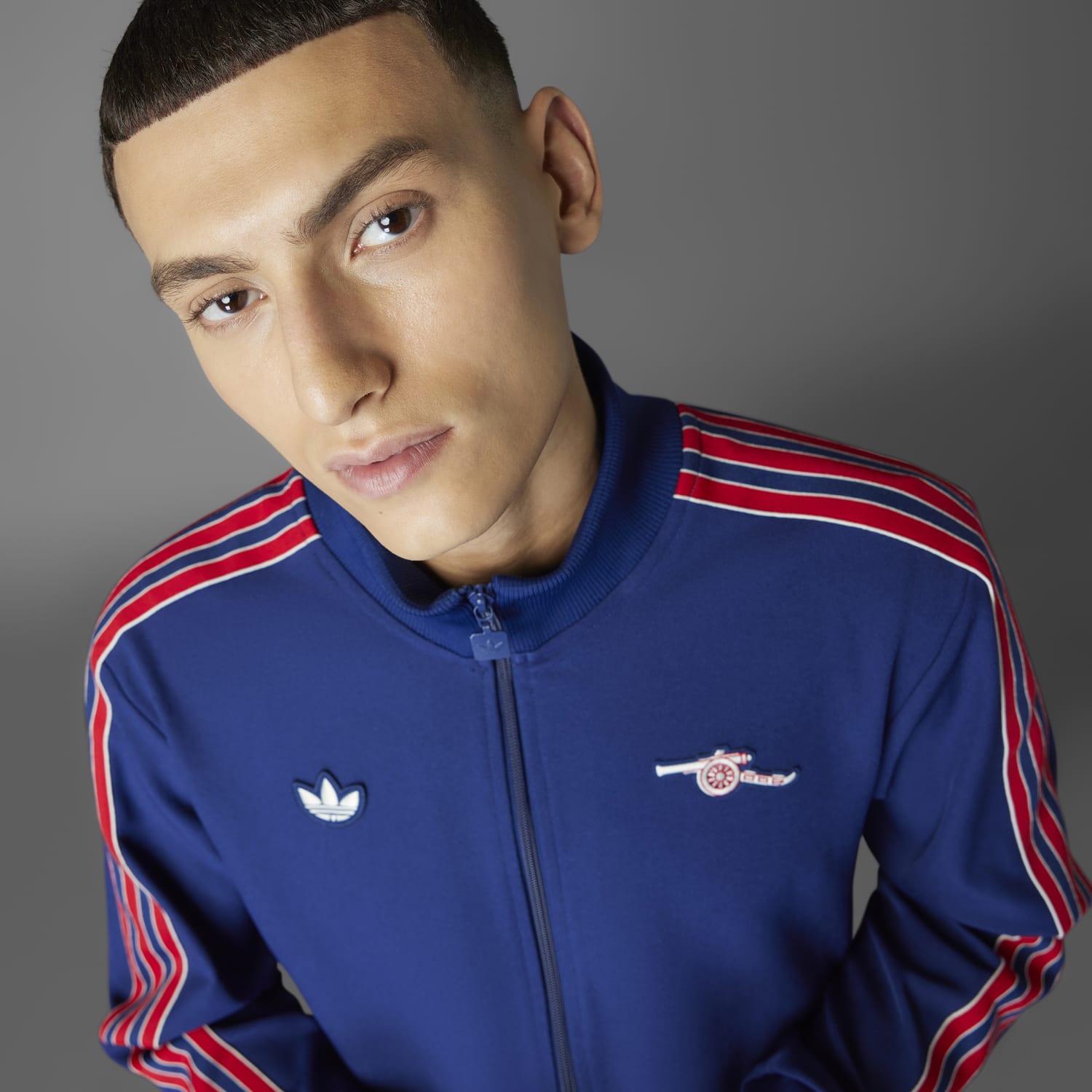 Close-up of adidas Arsenal Icon track jacket with sewn-on crest