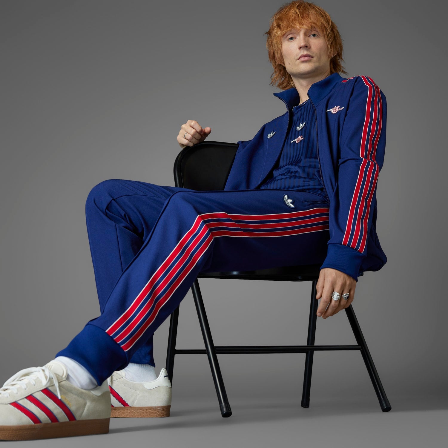 Front view of adidas Arsenal Icon Mens Track Pants highlighting the relaxed fit and drawstring waistband.
