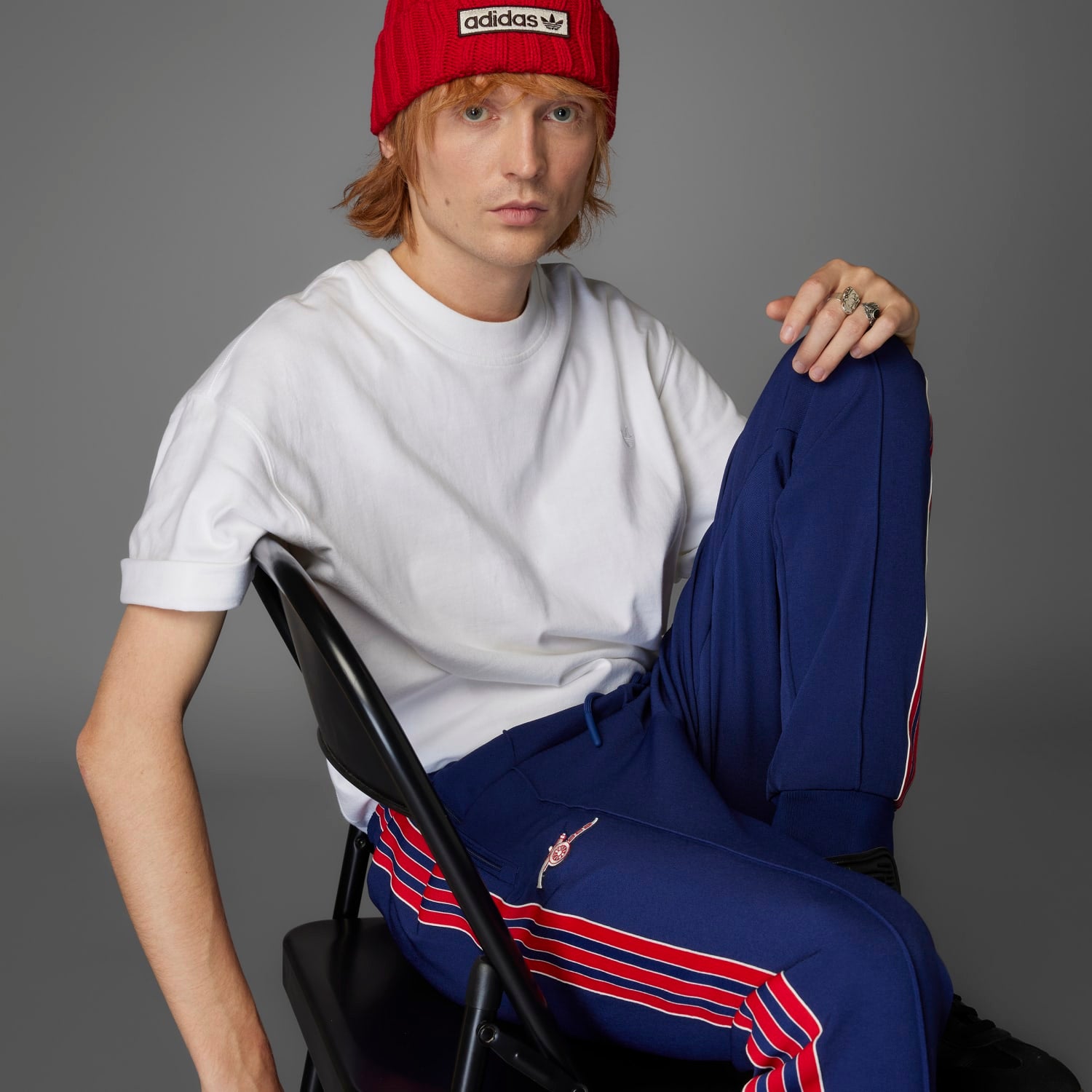 Side view of adidas Arsenal Icon Mens Track Pants with ribbed cuffs, perfect for casual outings.