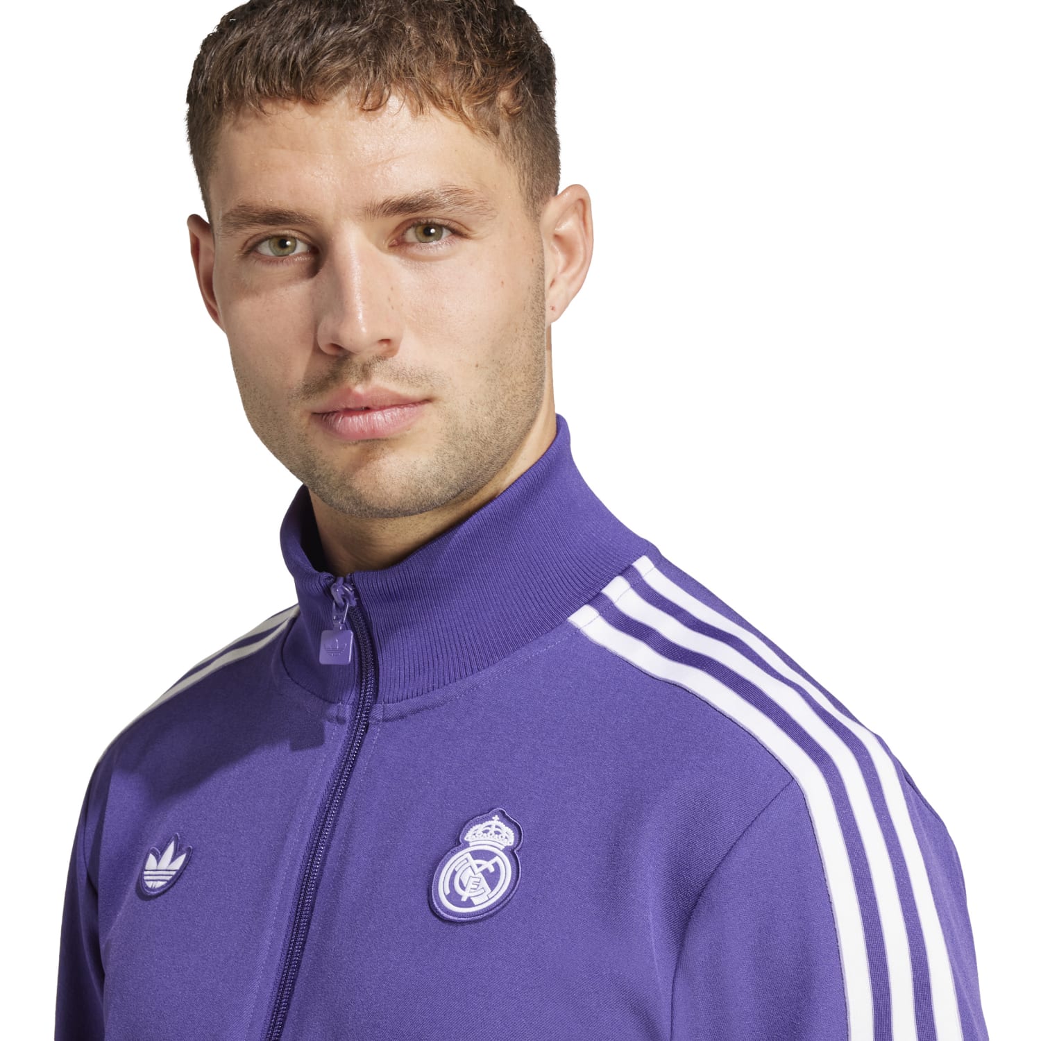 Men wearing the authentic Real Madrid football jacket during training