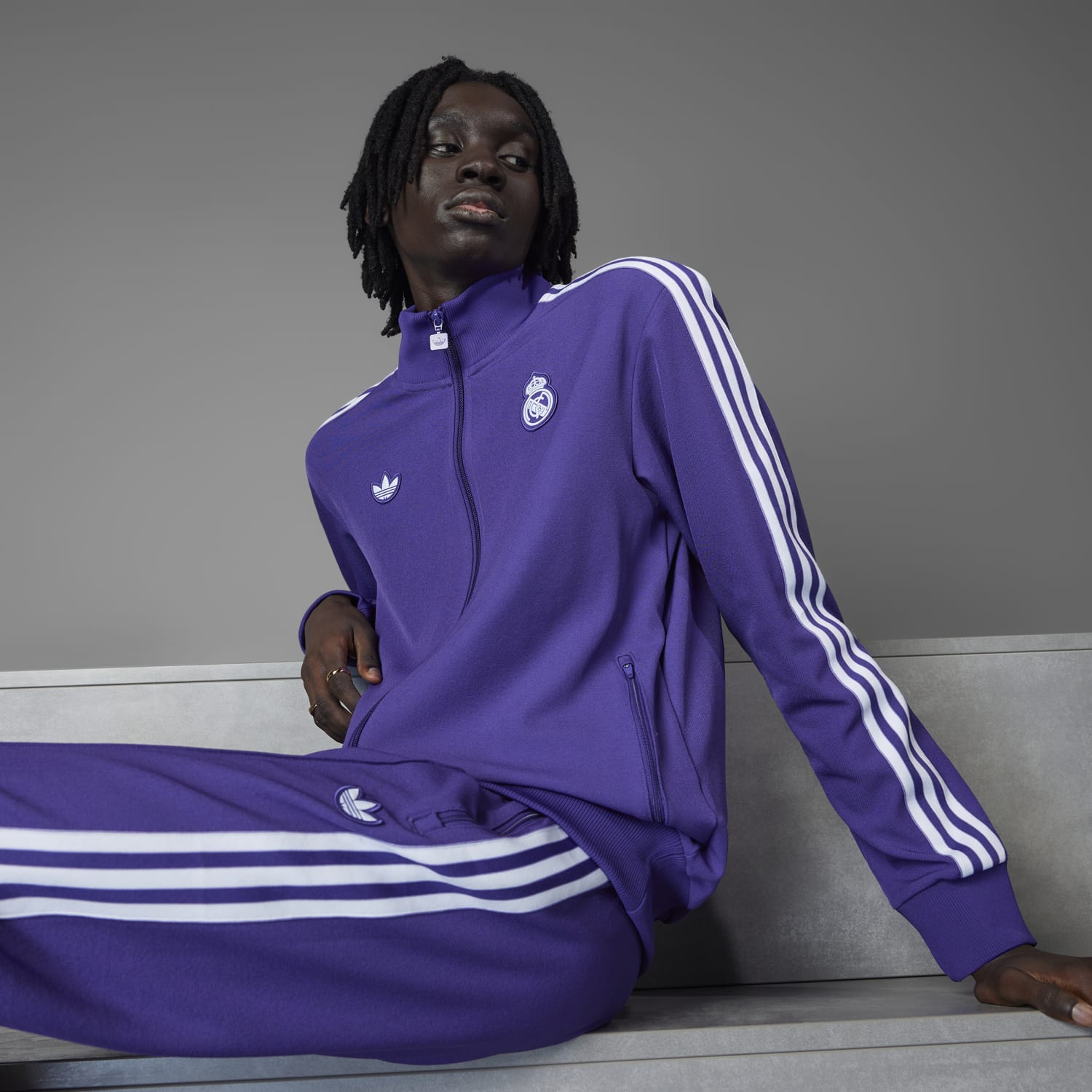 Men wearing the authentic Real Madrid football jacket during training
