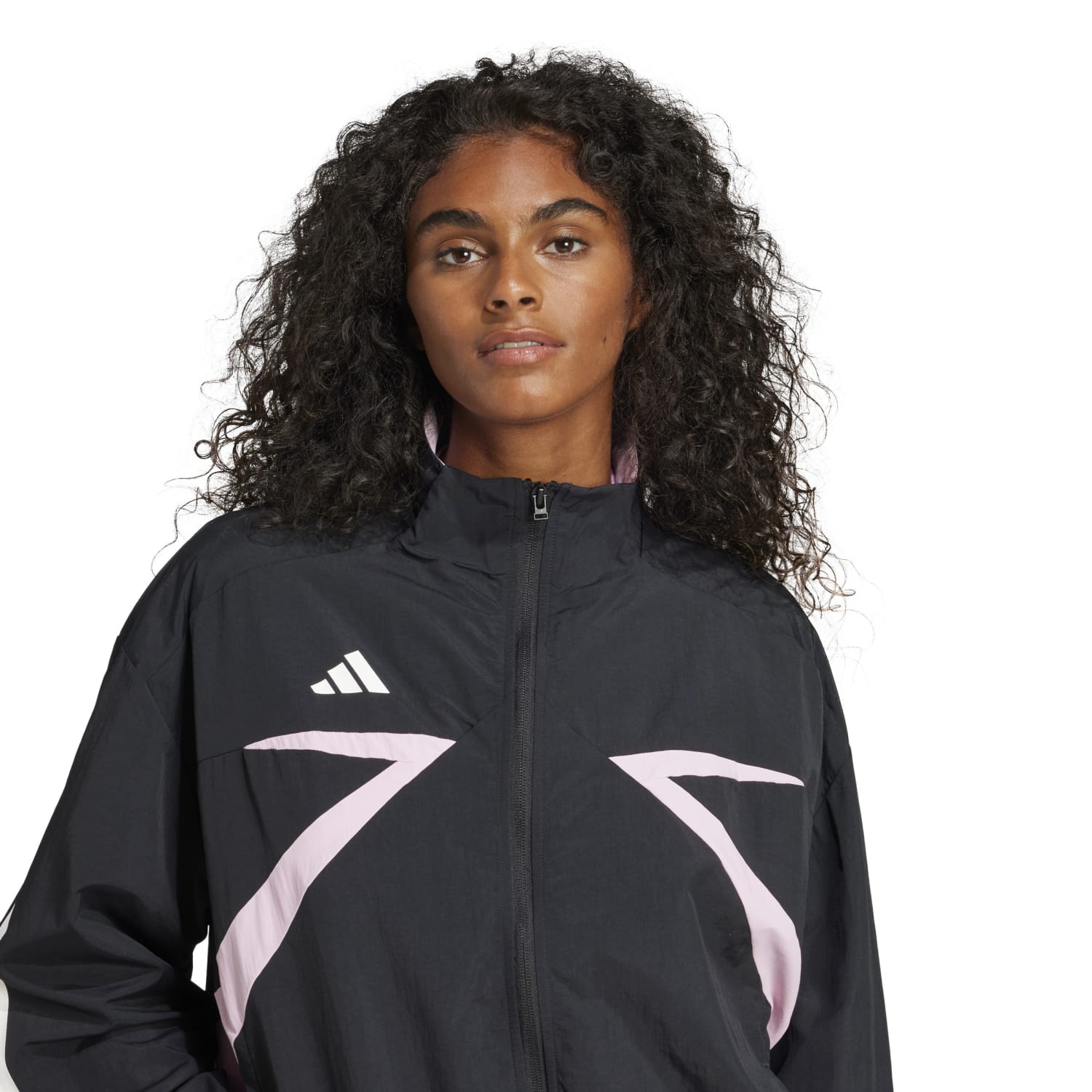 Front view of the Tiro Colorblock womens track jacket showing the stand collar and zip-up front