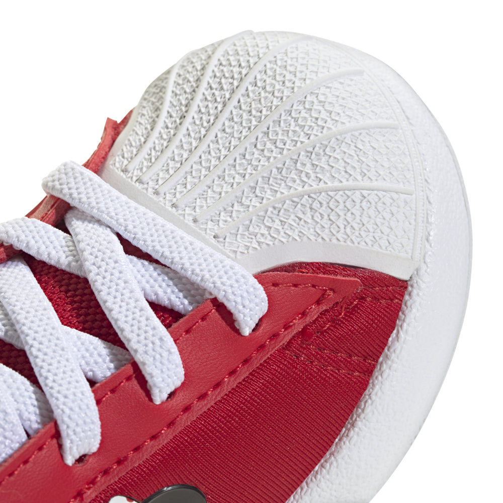 Side view of AdiFom Superstar 360 Toddler Sneakers showcasing stylish design and padded collar.