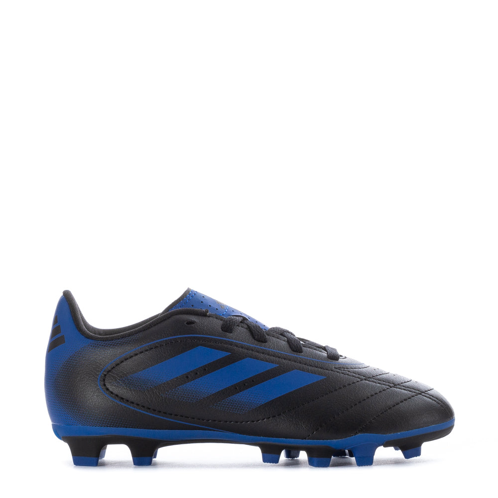 Close-up of Goletto IX kids football cleats on artificial turf