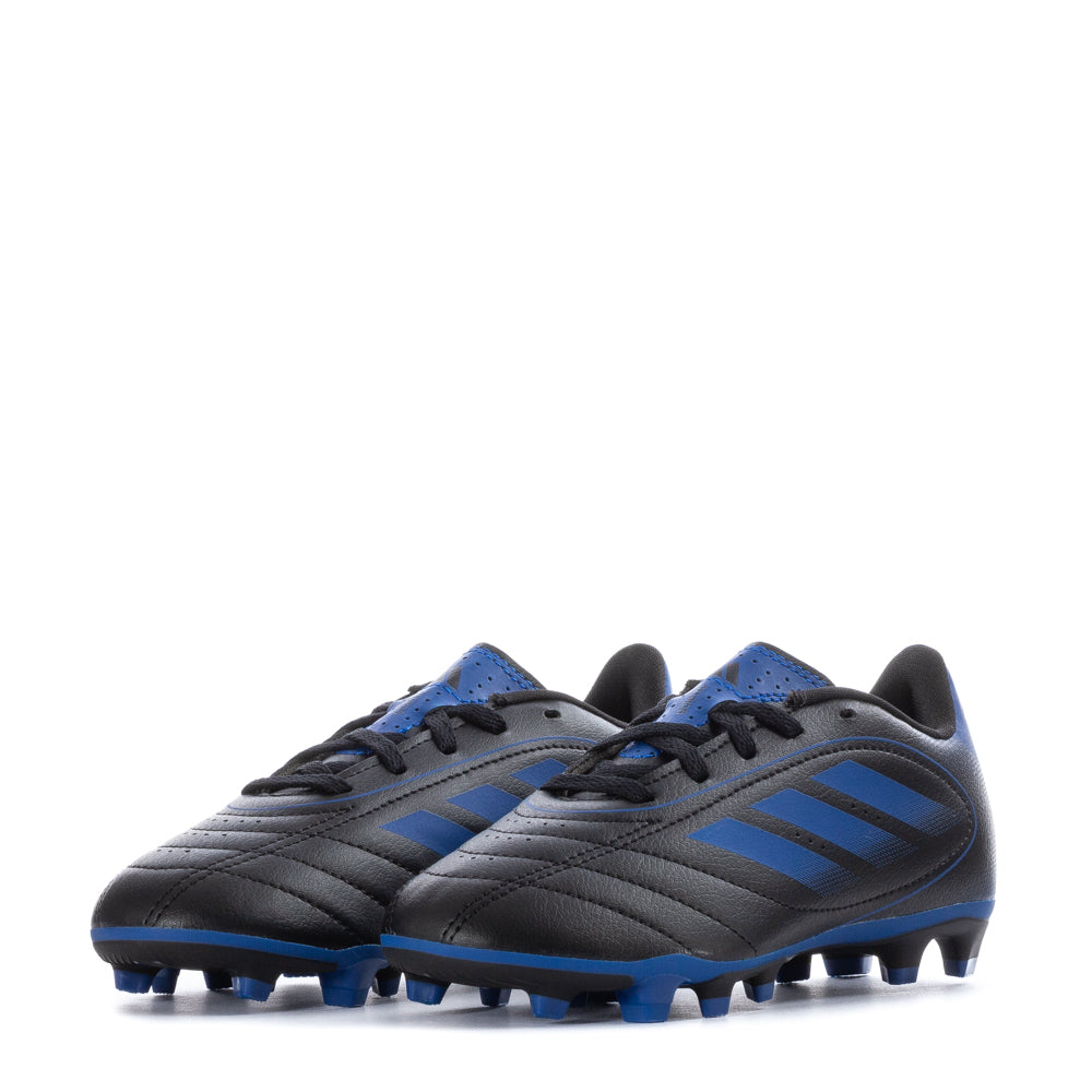 Kids wearing Goletto IX turf shoes during game on grass field