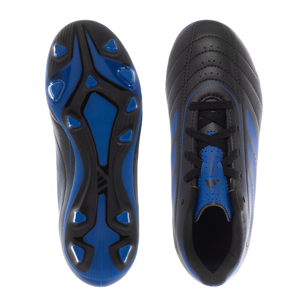 Close-up of Goletto IX kids football cleats on artificial turf