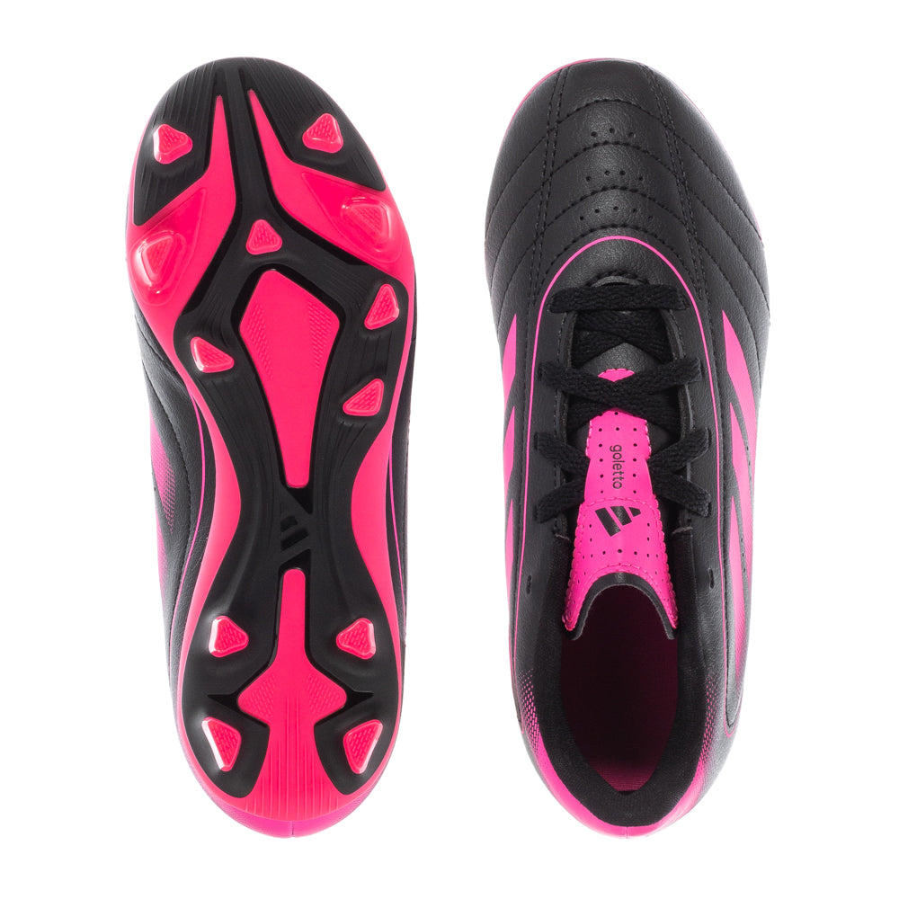 Adidas Goletto IX Youth Soccer Cleats on turf field, showcasing aggressive cleat pattern.