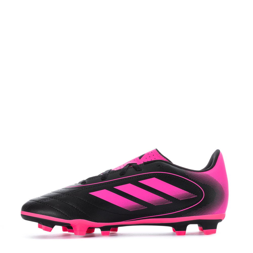 Close-up of the Adidas Goletto IX outsole designed for firm ground traction.