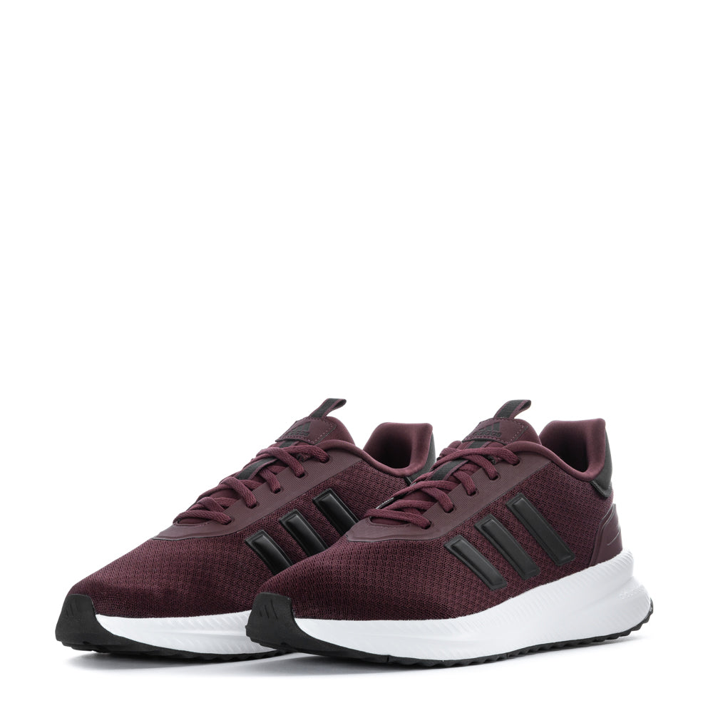 Adidas X PLR Path Mens Running Sneakers worn during a morning jog, demonstrating their performance.