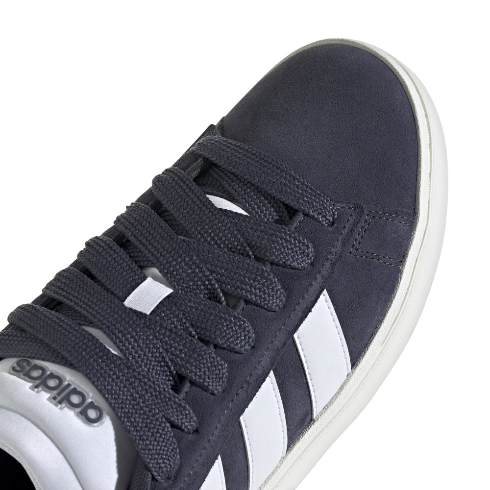 Adidas Grand Court Alpha sneakers on a model during a casual outing, demonstrating versatility.
