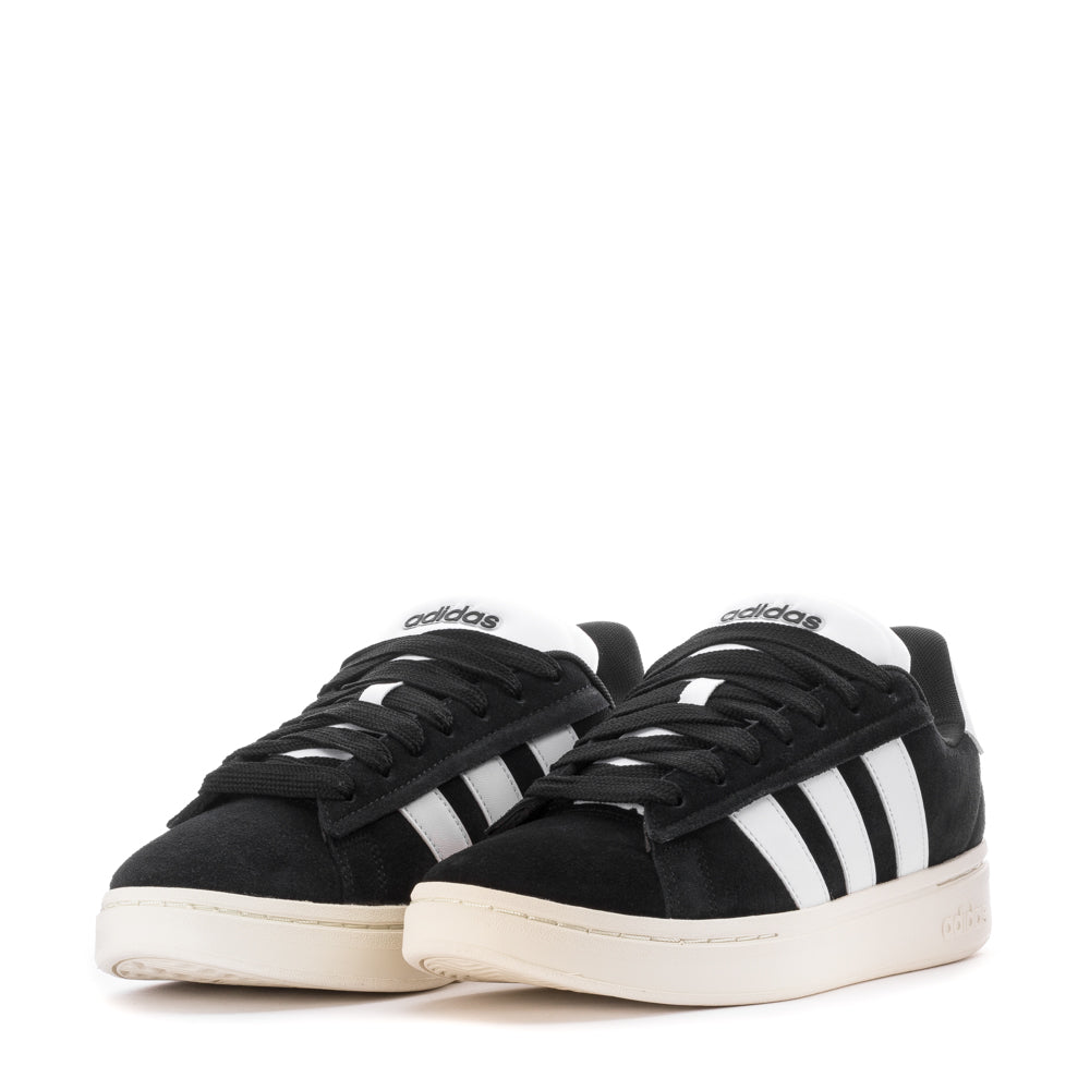 Close-up of the durable rubber outsole of the Adidas Grand Court Alpha sneakers, highlighting its longevity.