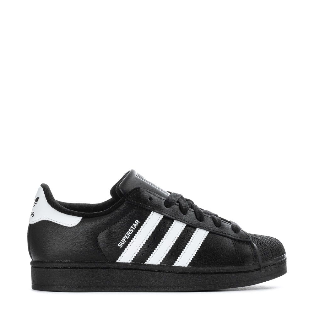 Close-up of Adidas Superstar II Youth Sneakers highlighting the iconic rubber shell-toe.