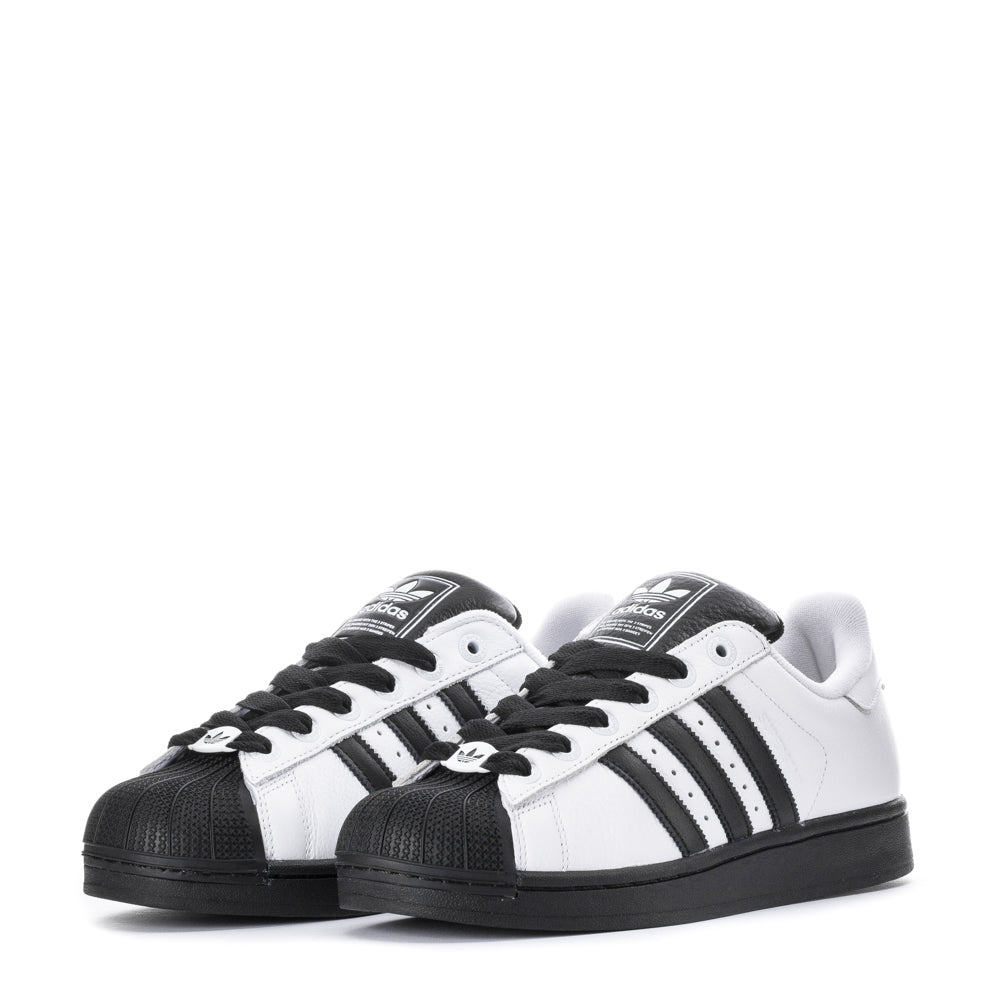 Close-up of the Adidas Superstar II Mens White Leather Sneakers featuring the textured leather and serrated 3-Stripes.