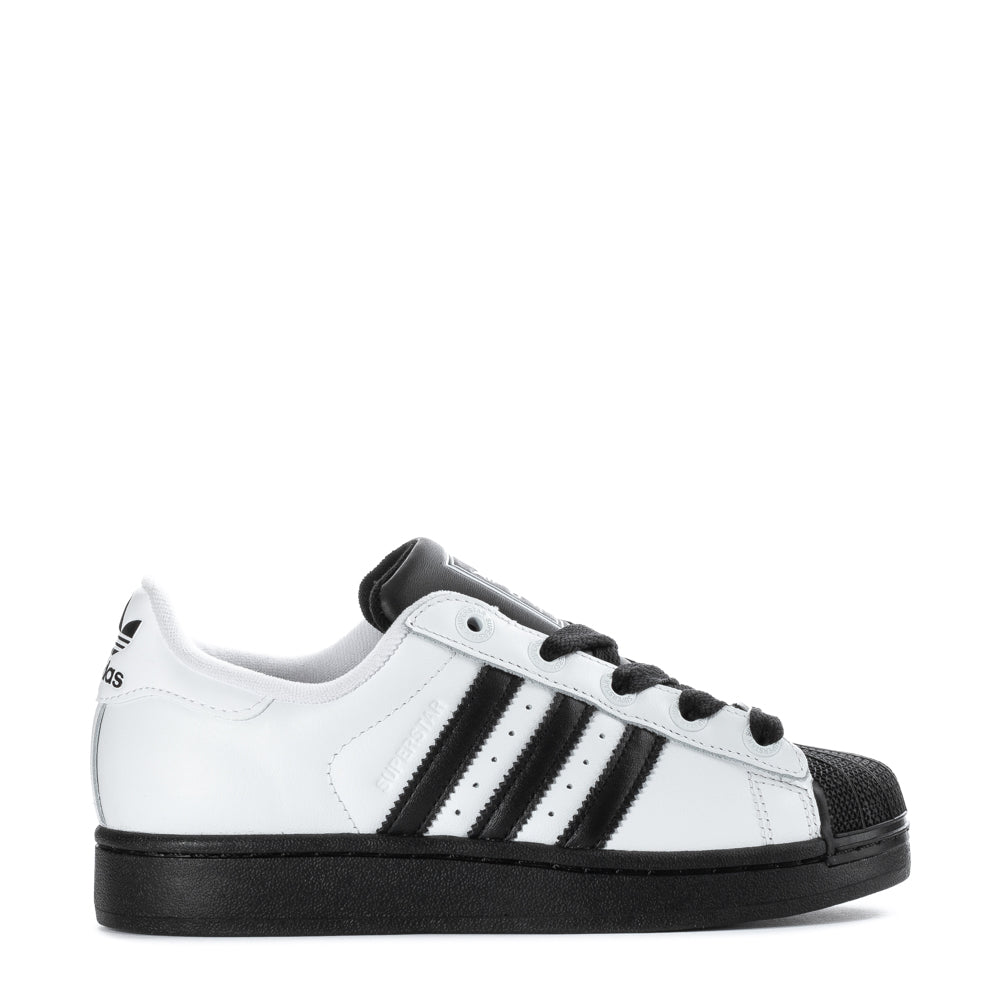 Side view of NextGen Superstar Youth Sneakers, highlighting the sleek design and padded collar.