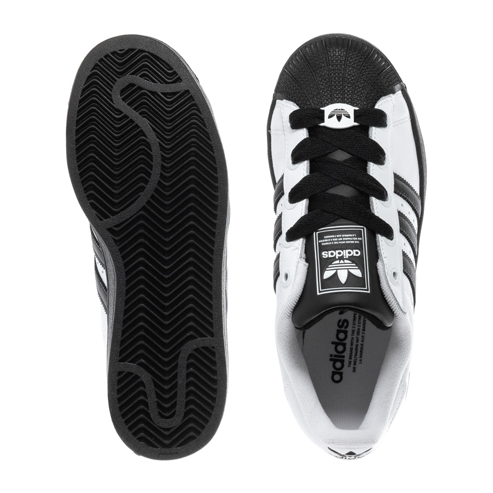 Side view of NextGen Superstar Youth Sneakers, highlighting the sleek design and padded collar.
