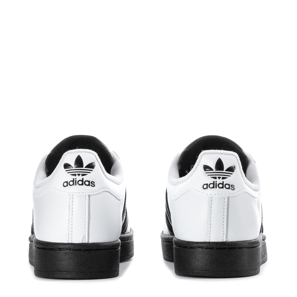 Top-down view of the NextGen Superstar Youth Sneakers, showcasing the lace-up feature and logo.