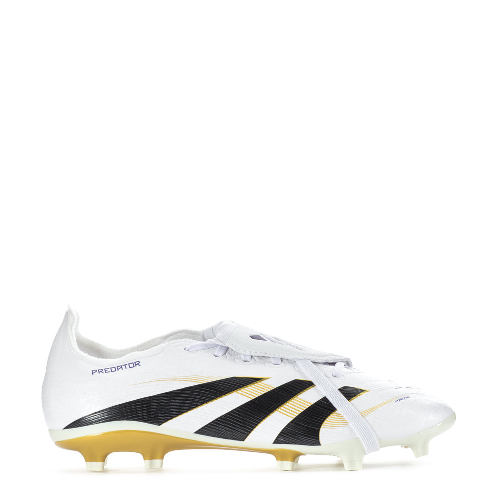 Angled side shot of men's soccer shoes showing hybrid stud plate on firm ground
