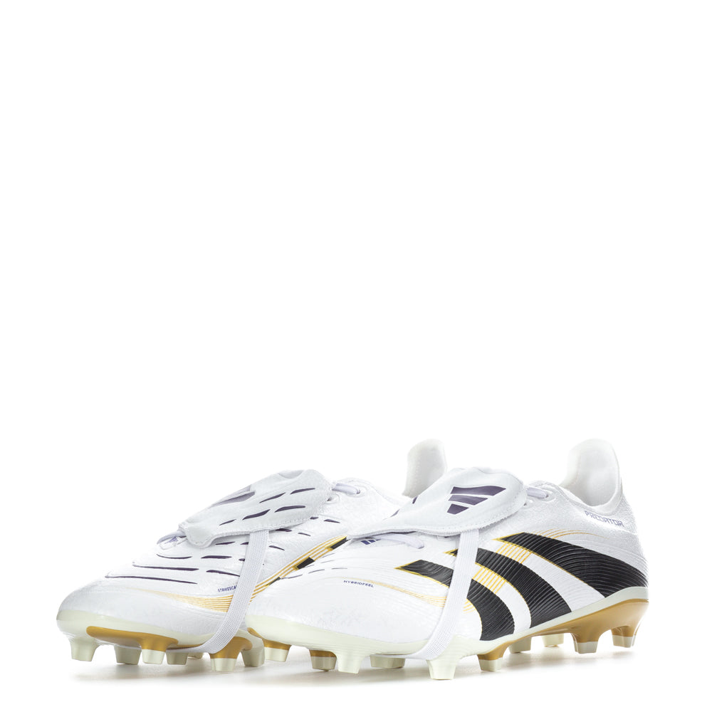 Player sprinting in Predator League cleats on artificial turf