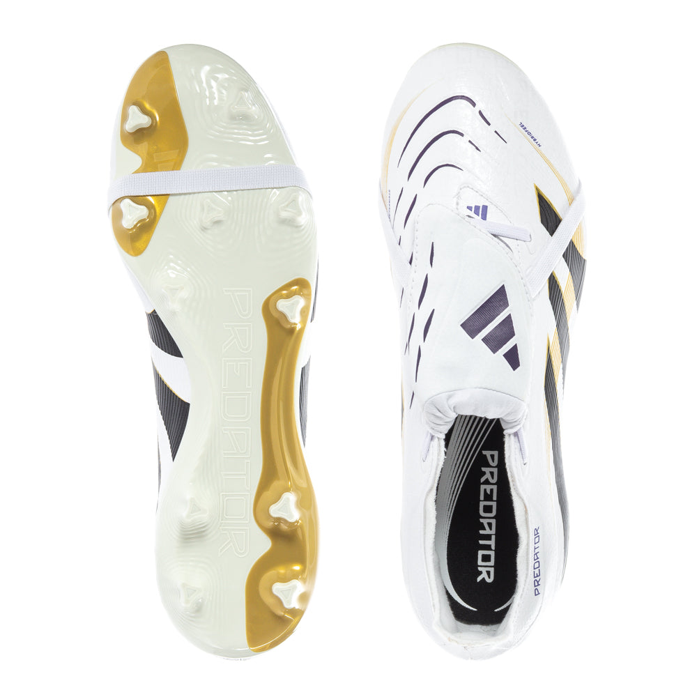 Angled side shot of mens soccer shoes showing hybrid stud plate on firm ground