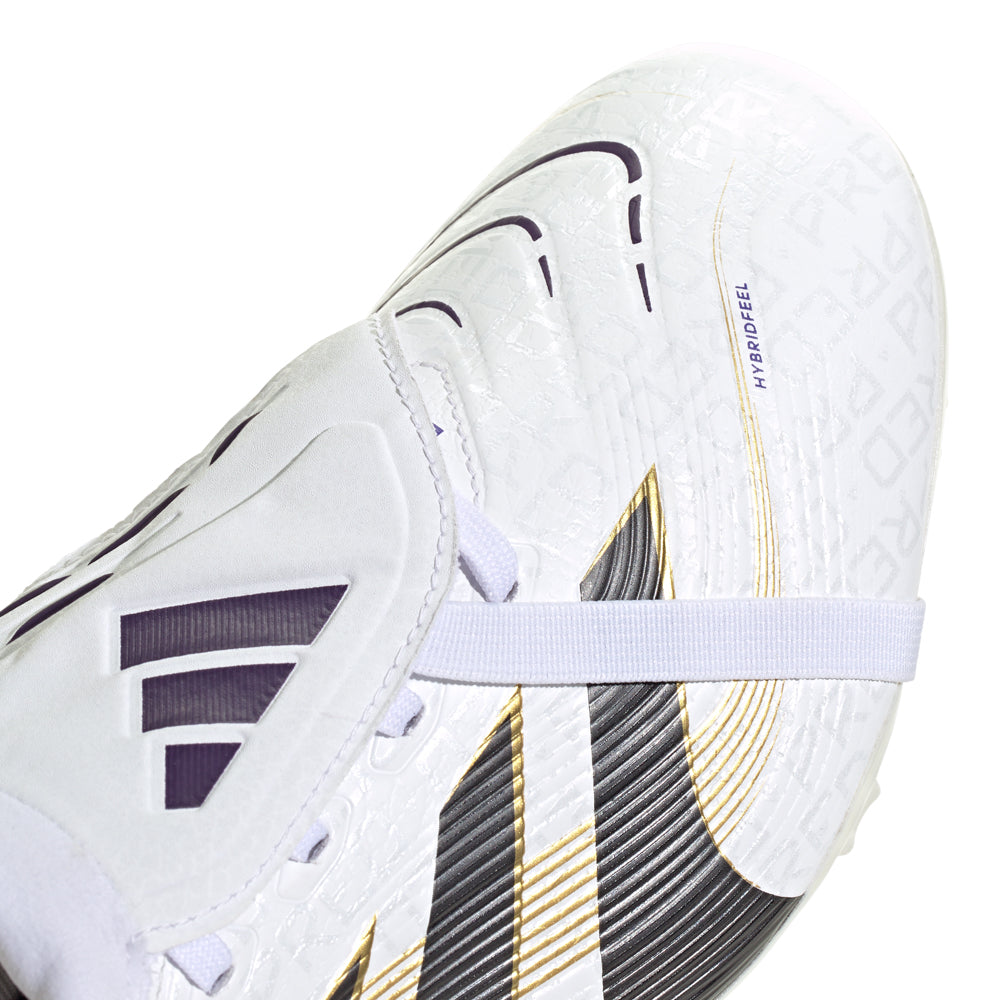 Player sprinting in Predator League cleats on artificial turf