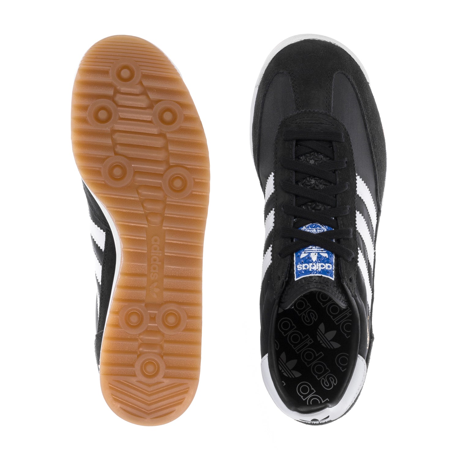Side view of adidas Originals mens leather sneakers showcasing classic design