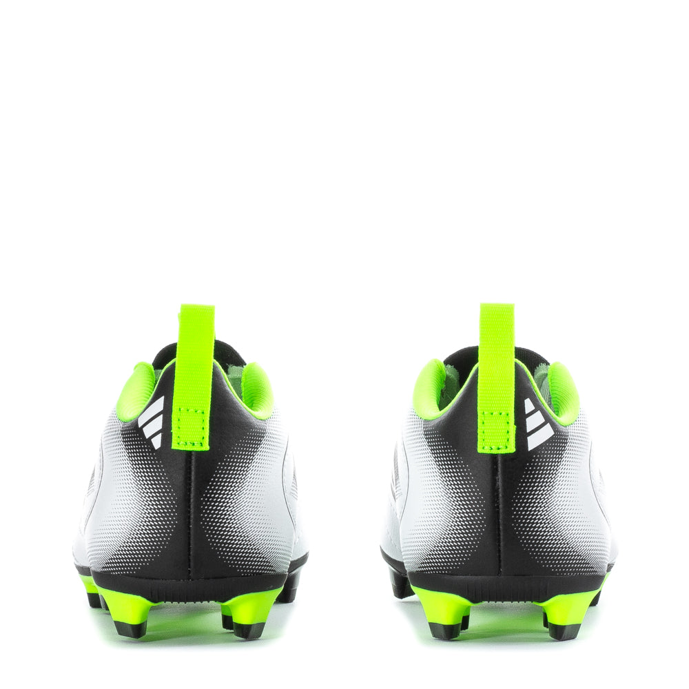 Young player wearing versatile kids soccer shoes for outdoor sports