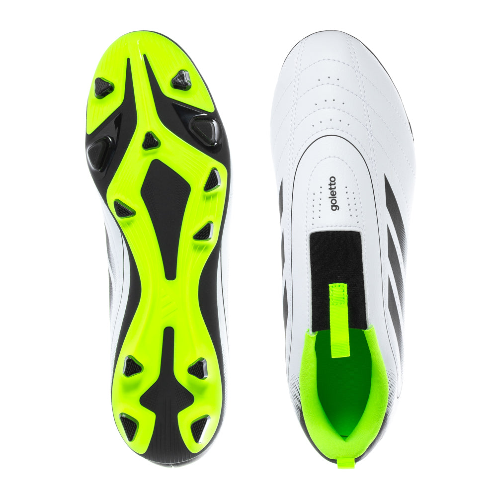 Top-down view of lace-free adidas Goletto IX youth firm ground cleats in bright solar green on a grassy pitch