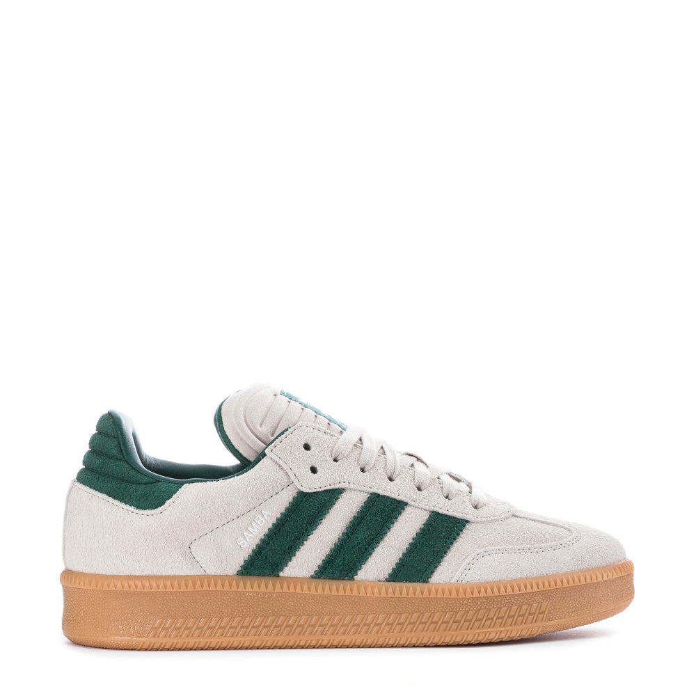 Adidas Samba XLG sneakers showcasing the oversized design and leather details from the side. Adidas Samba XLG sneakers showcasing the oversized design and leather details from the side.