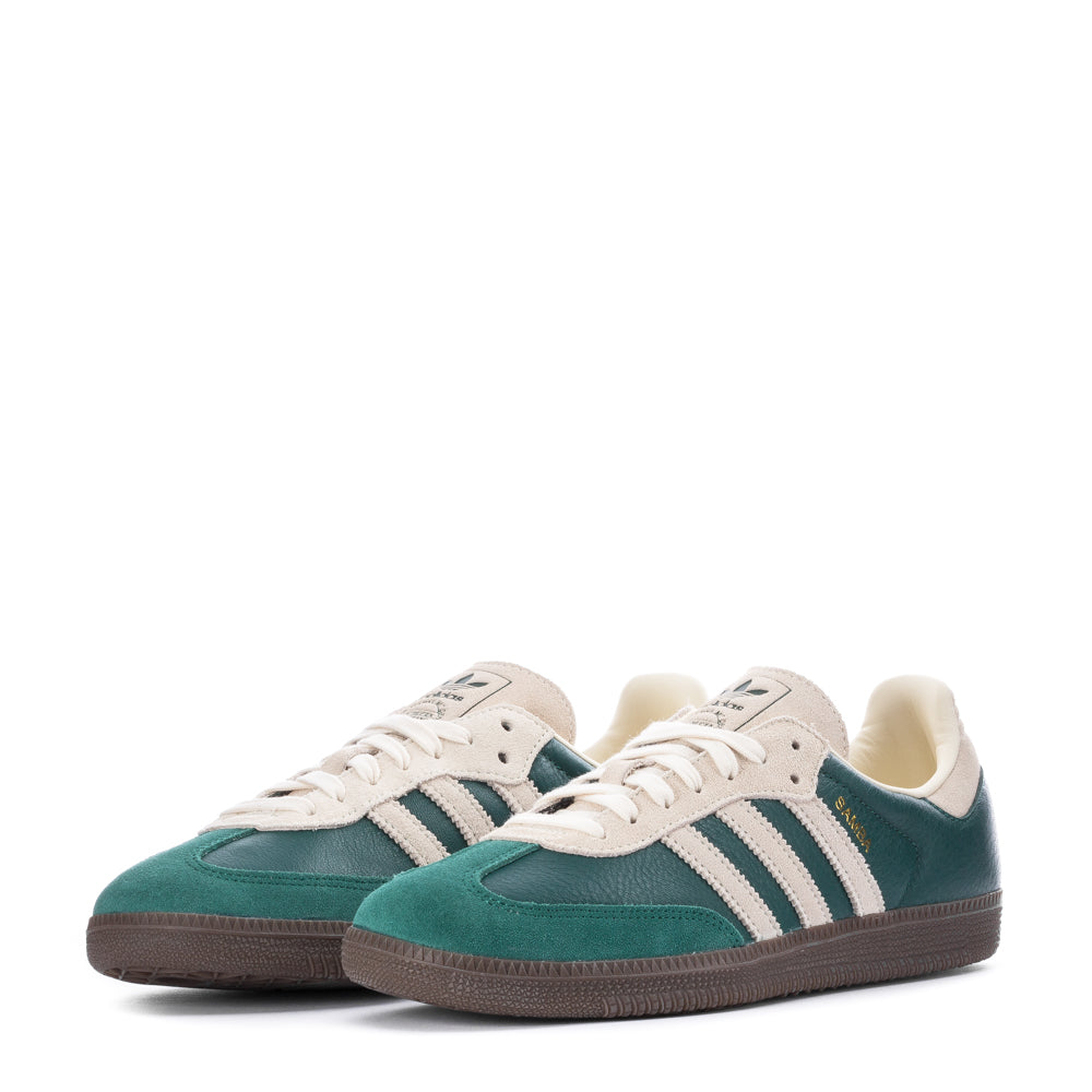 Fashionable man wearing Adidas Samba OG sneakers while walking on the street