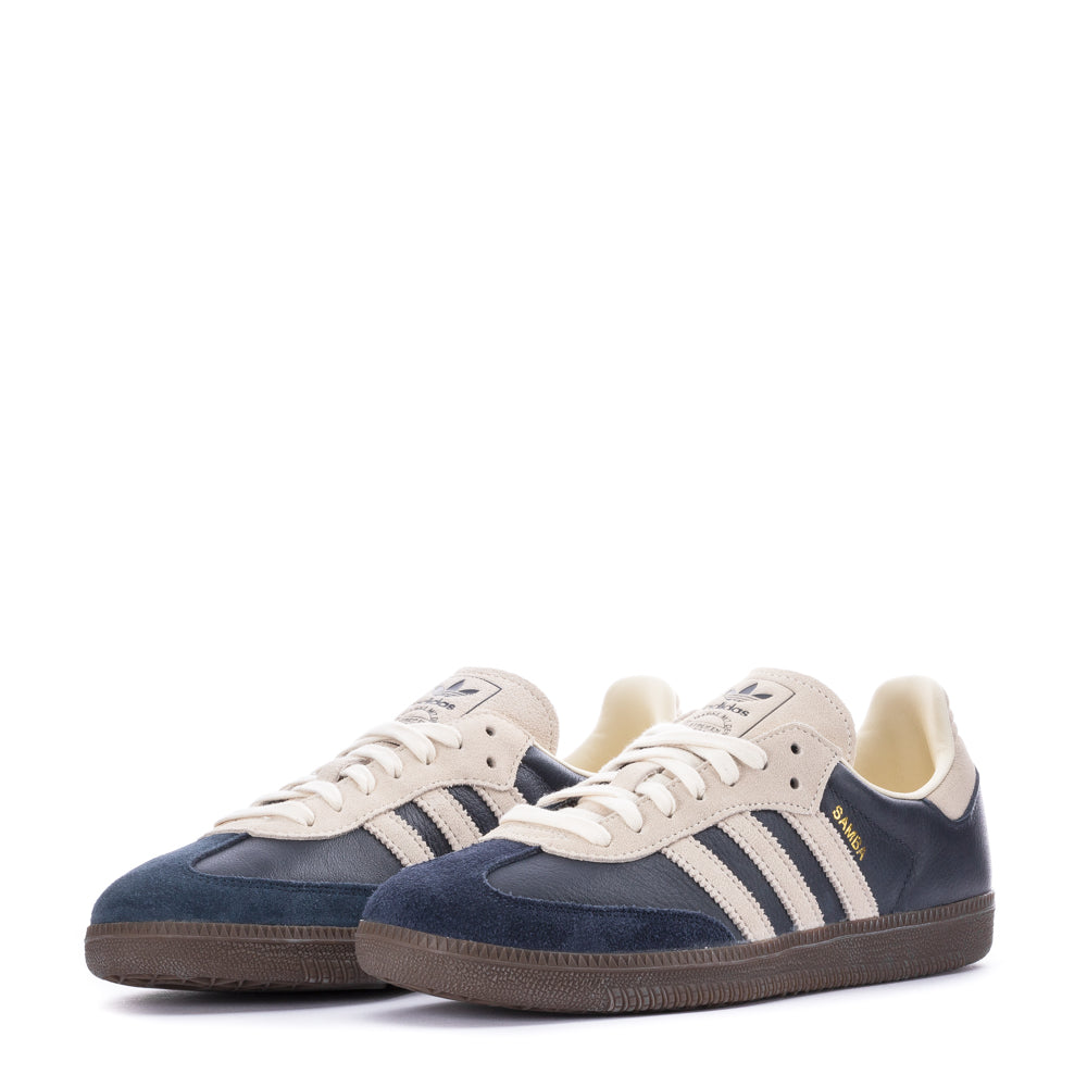 Side view of Adidas Samba OG mens shoes highlighting the serrated 3-Stripes design