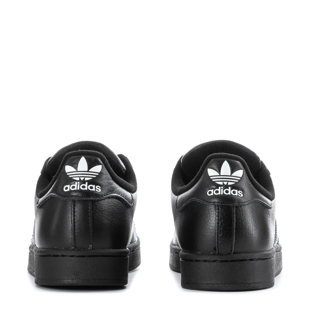Close-up of the rubber shell-toe and serrated 3-Stripes on adidas Superstar II sneakers