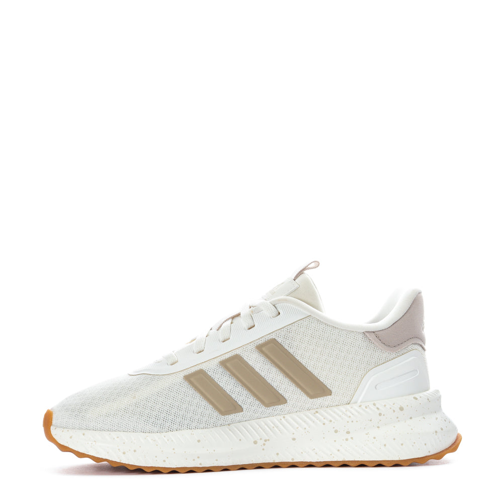 Side view of the sneakers demonstrating the durable rubber sole and mesh upper