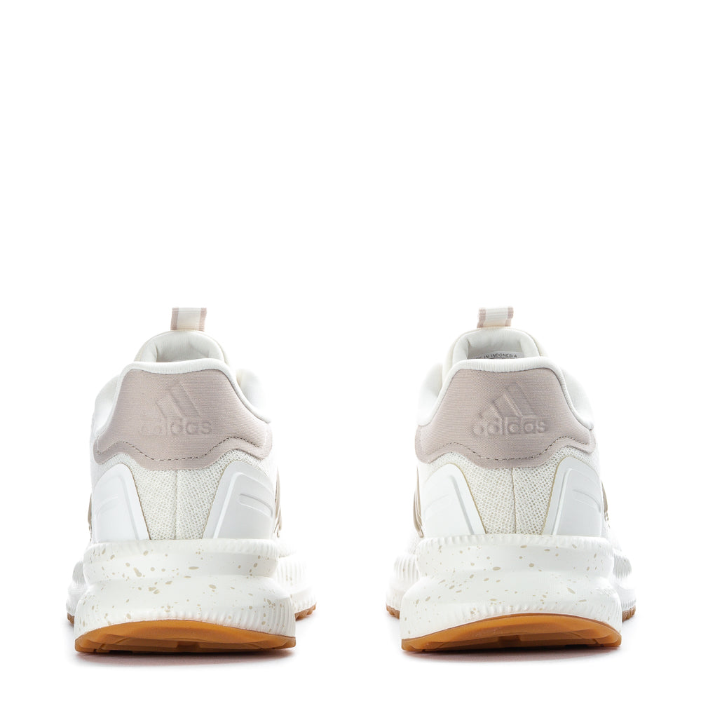 Side view of the sneakers demonstrating the durable rubber sole and mesh upper