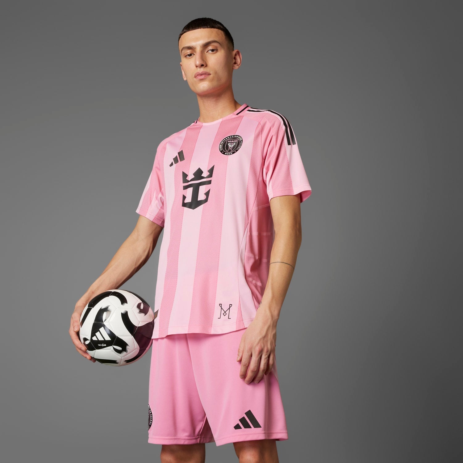 Side view of the Messi jersey highlighting the three-stripe adidas logo and comfortable fit.