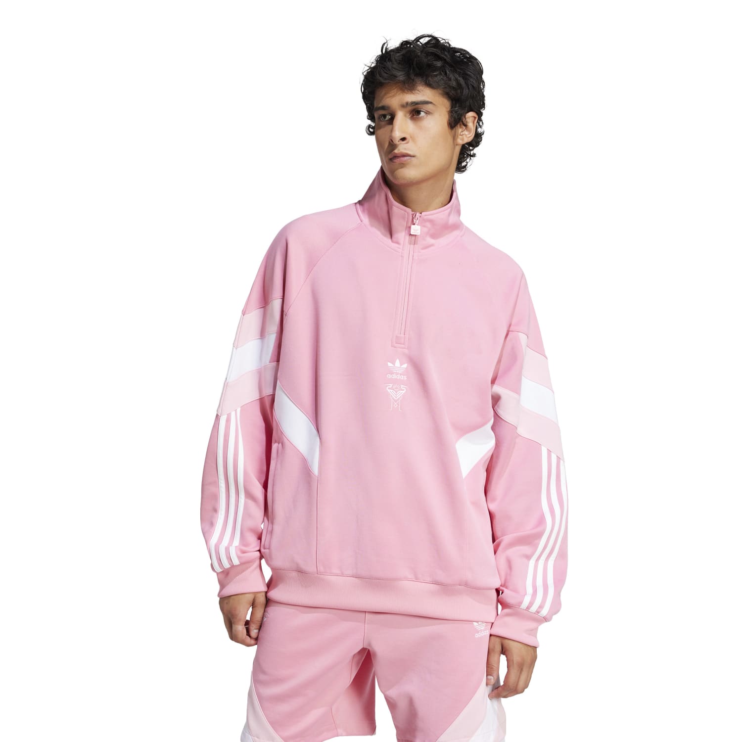 Back angle showing ribbed hem and partial zip styling on the mens sports jacket