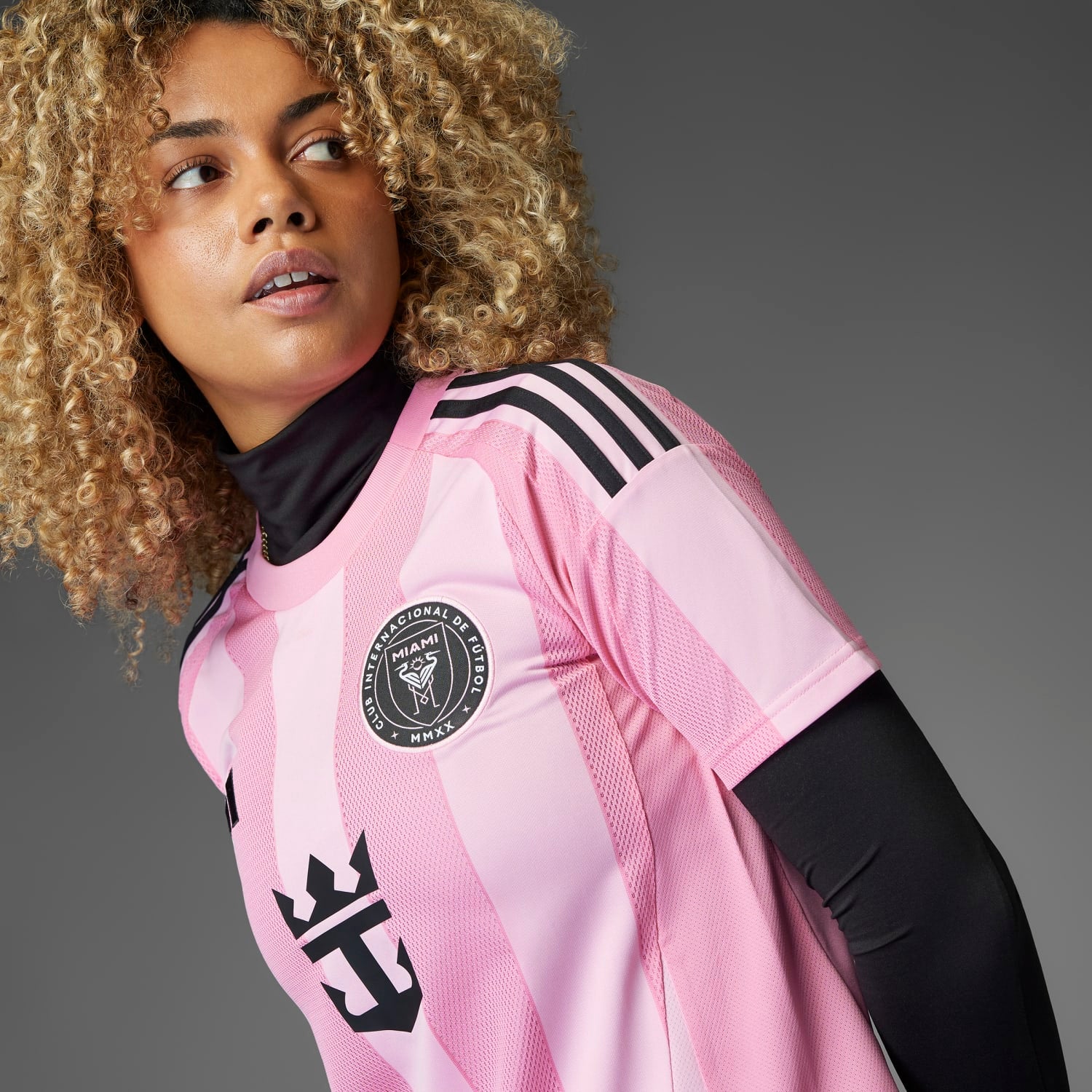 Front view of the Adidas Inter Miami Womens Home Soccer Jersey highlighting the team seal and sponsor logo.