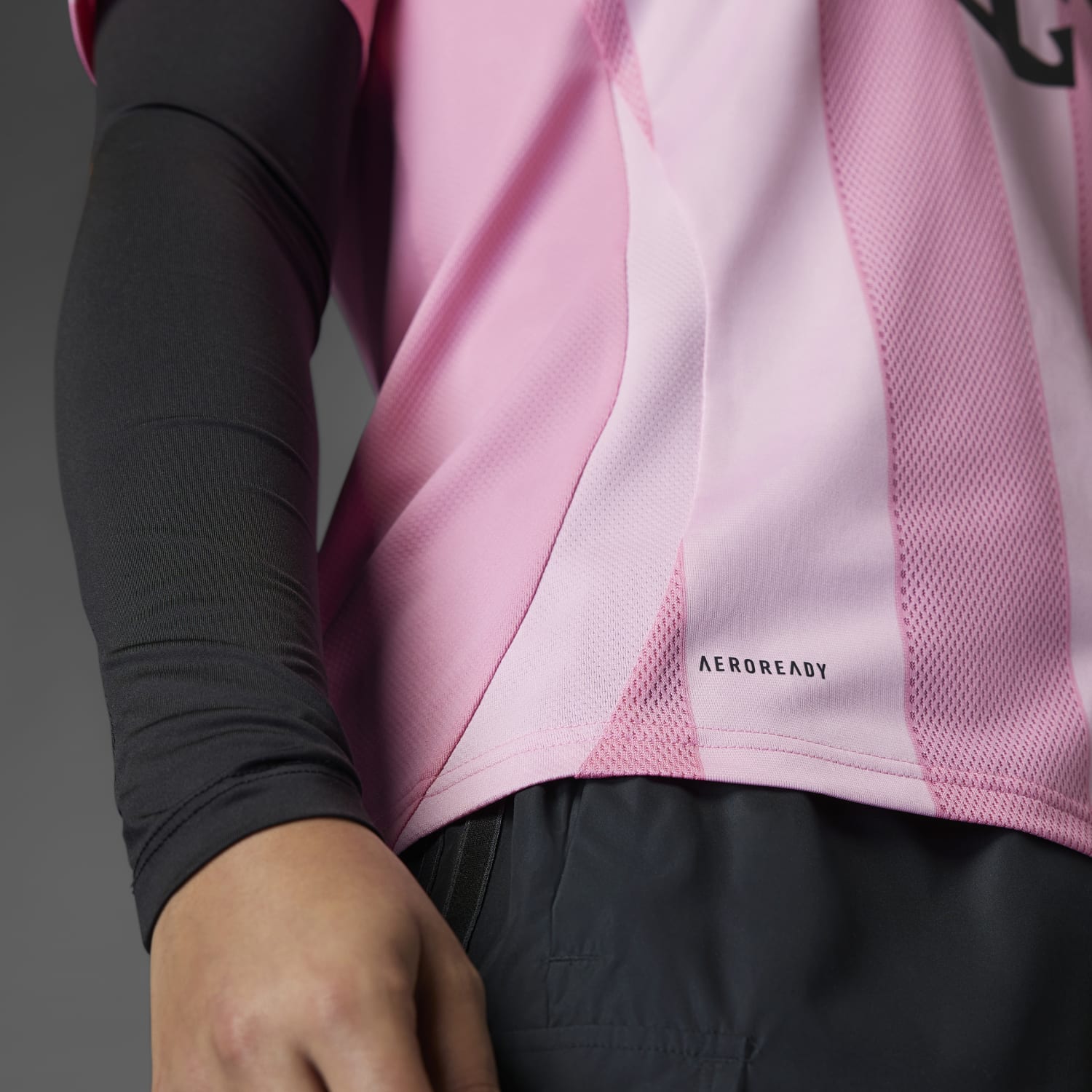 Side angle of the Adidas Inter Miami Womens Home Jersey, perfect for showcasing the Adidas three-stripe detail.