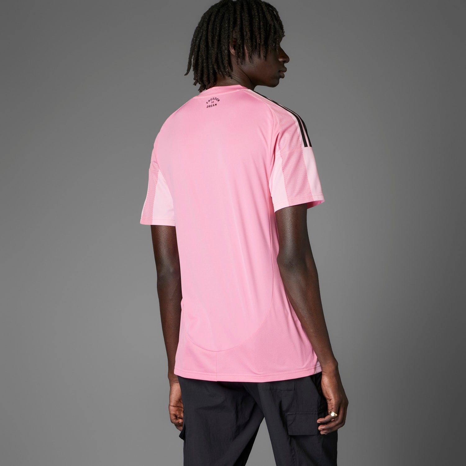 Front view of Inter Miami 25/26 replica mens soccer jersey showing team seal and sponsor logo