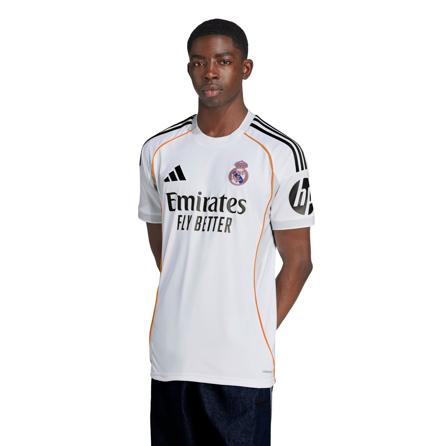Men wearing the authentic adidas Real Madrid jersey during a match, emphasizing comfort and fit
